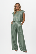 Eva - Conjunto de dos piezas con top corto y pantalón de pierna ancha.